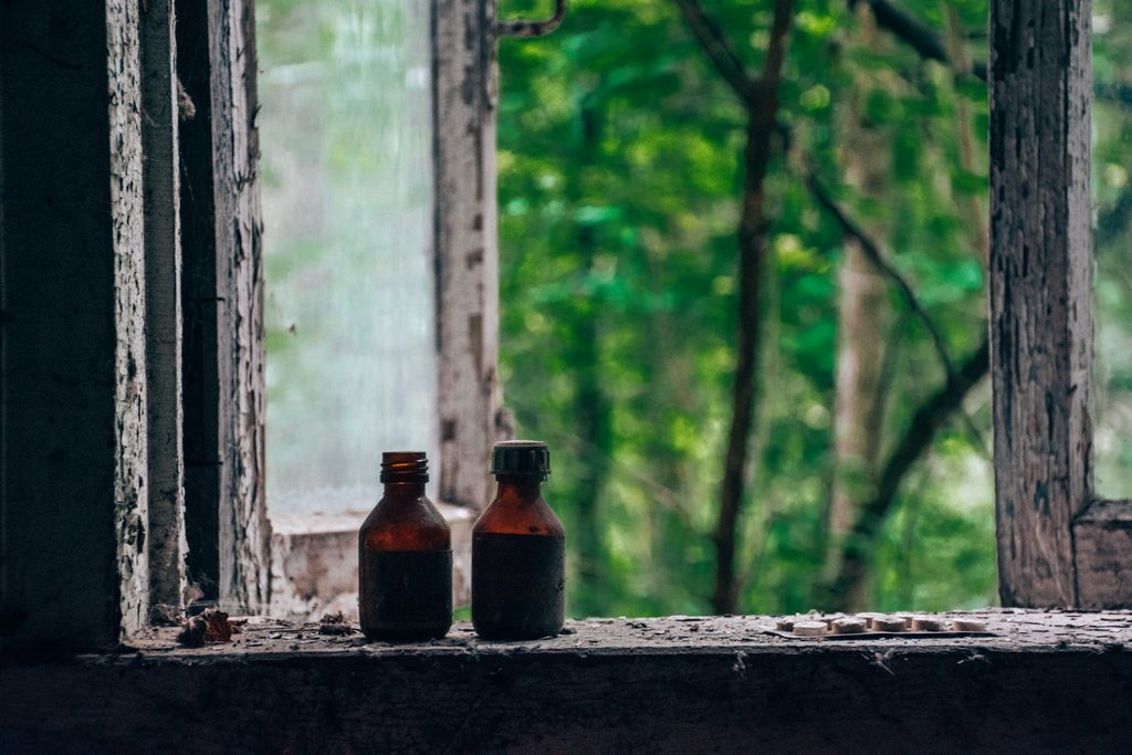 <img src="old bottles.png" alt="old medication bottles on a window sill">
