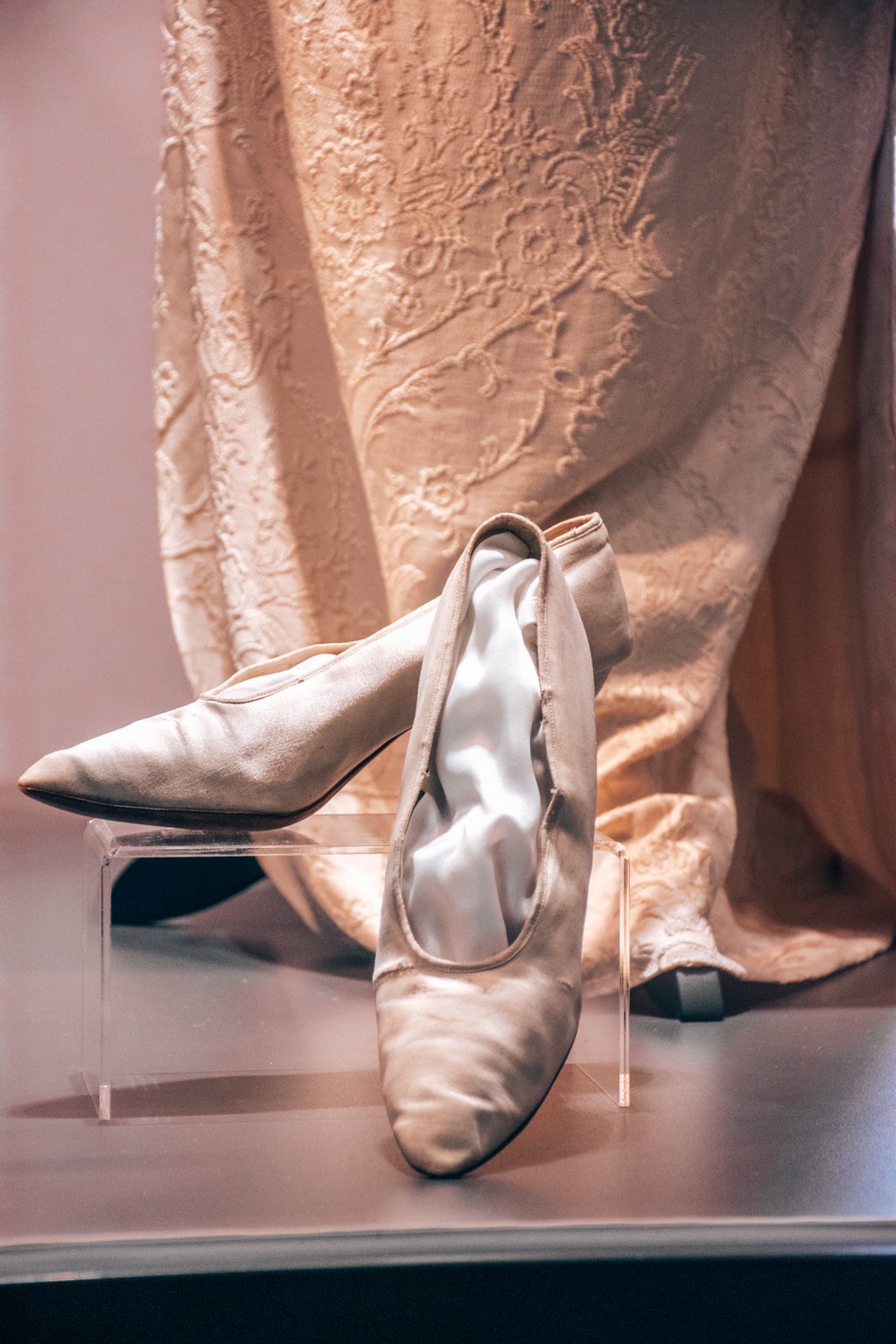 <img src="white shoes.png" alt=antique white wedding shoes">