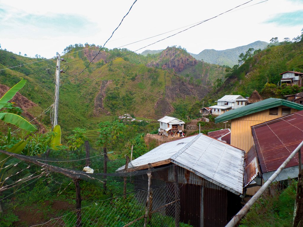 <img src="village.gif" alt="mountain view from a village at the northen philippines">