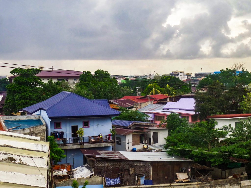 <img src="buildings.gif" alt="buildings in a pinoy town">